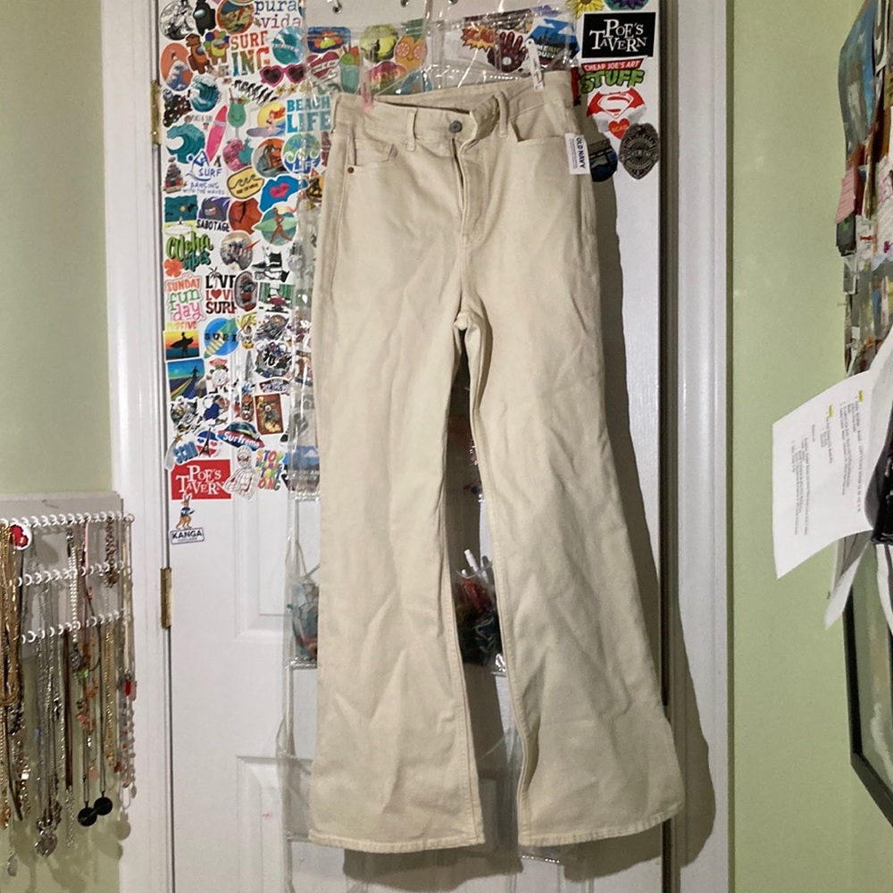 Old navy cream flare with a slight slit at bottom